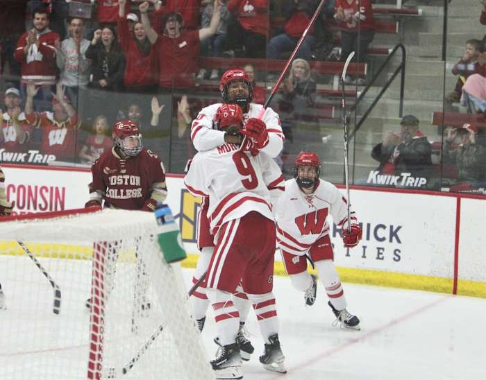 Wisconsin's Laila Edwards (10) hugs Ava Murphy (9) after Murphy's goal in the third period of Wisconsin's 12-2 victory over Boston College on Friday Oct. 6, 2023 at LaBahn Arena in Madison, Wis.